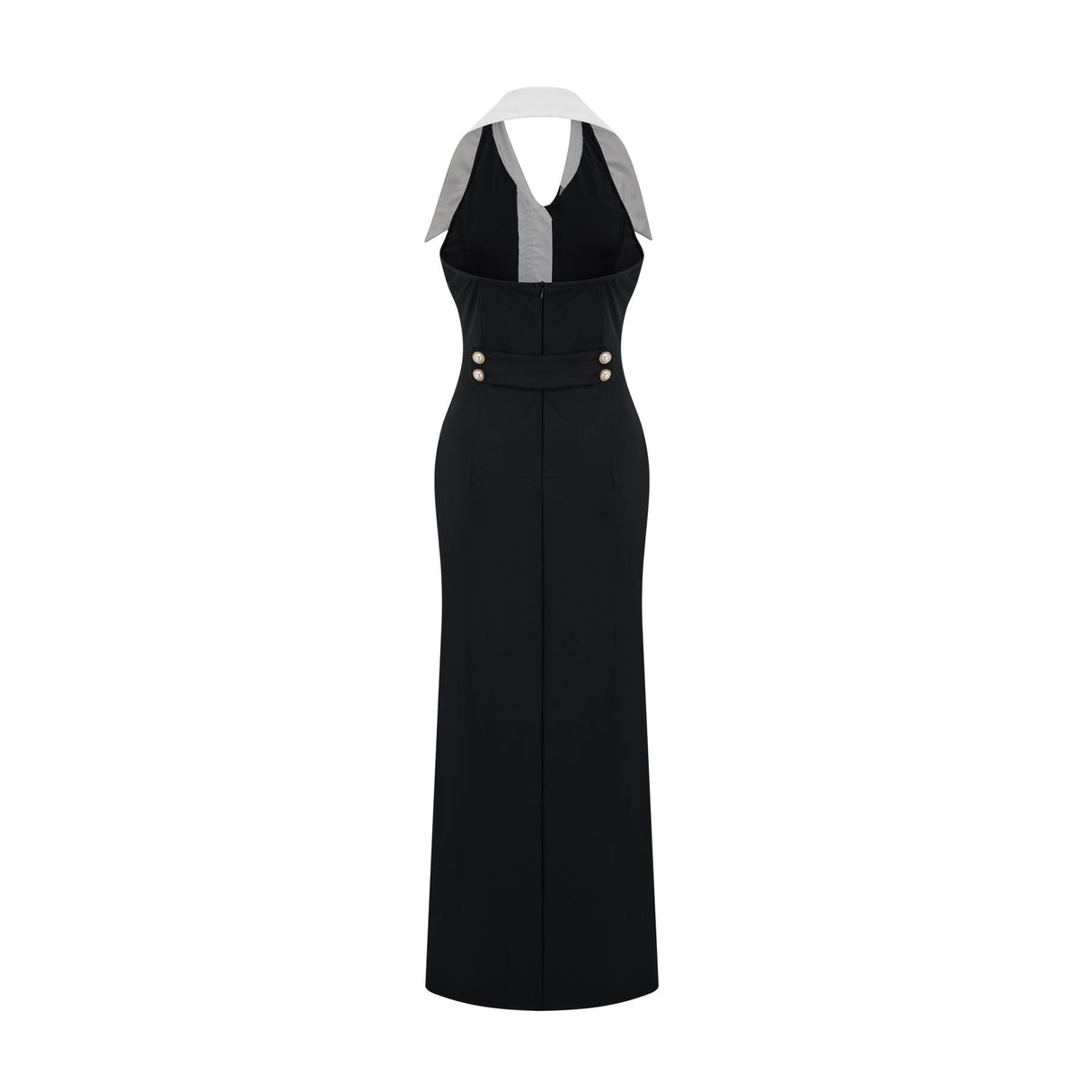Woman wearing a fitted maxi dress with colorblocked design featuring contrasting colors and a long silhouette