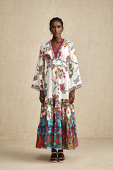 Woman wearing a floral print midi dress with V neckline featuring Helene design