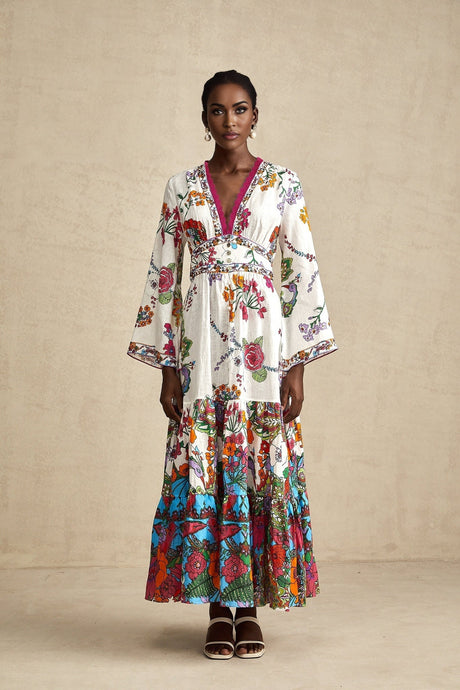 Woman wearing a floral print midi dress with V neckline featuring Helene design