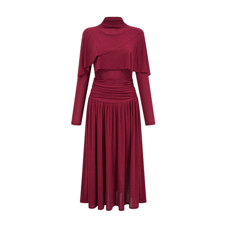 Woman wearing a red midi dress with ruched details and a flap design on the bodice