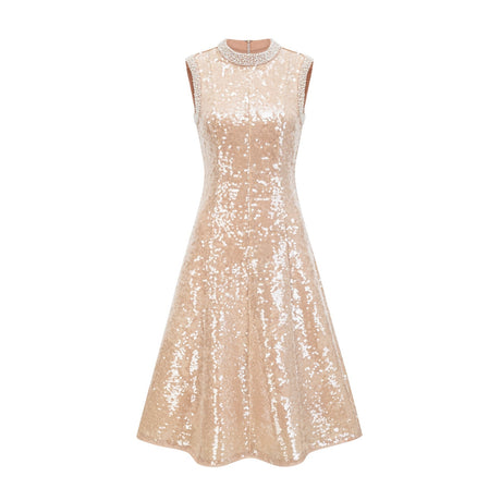 Woman wearing a shimmering midi dress adorned with faux pearls and sequins