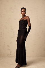 Woman wearing black floral lace corset with matching skirt and gloves elegant formal outfit set