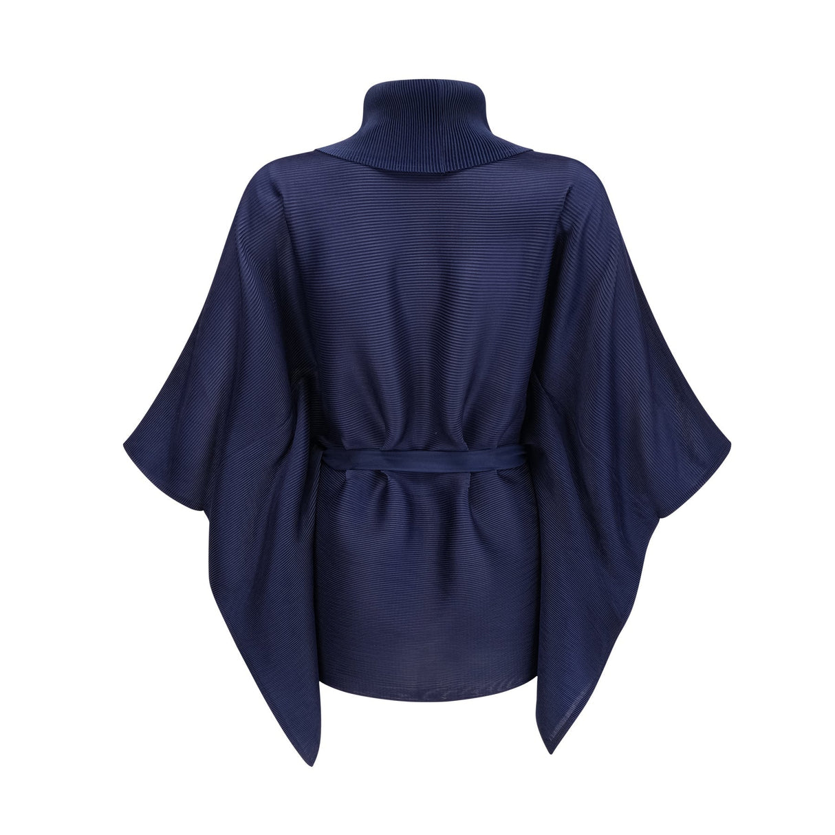 Woman wearing blue patterned cape and matching skirt set with creased texture and allover print design
