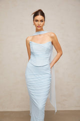 Woman wearing blue ruched tulle top and matching skirt set Lea style outfit with gathered fabric detail