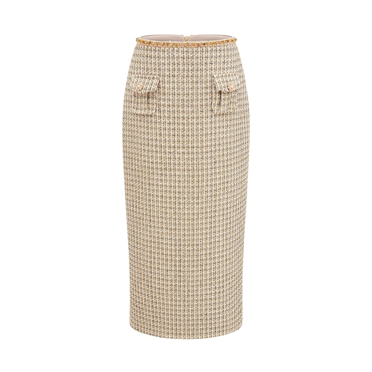 Woman wearing gold tweed jacket and matching skirt with sequin embellishments elegant coordinated outfit set