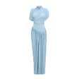 Woman wearing long asymmetric pleated maxi dress in light blue color