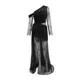 Woman wearing long black one shoulder dress with side cutout