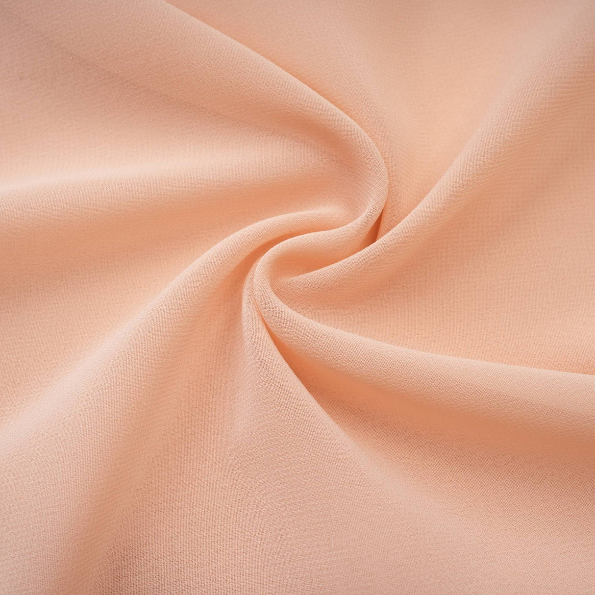 Woman wearing long pink chiffon maxi dress with ruffle details and halter neck style Mariah dress shown in full length view