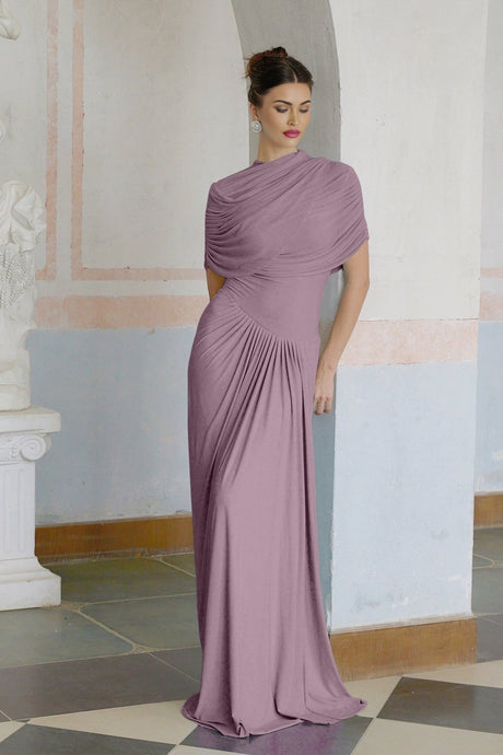 Woman wearing long purple asymmetric dress with pleated skirt and flowing design