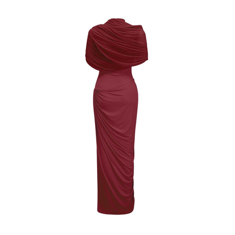 Woman wearing long red asymmetric pleated maxi dress with one shoulder strap