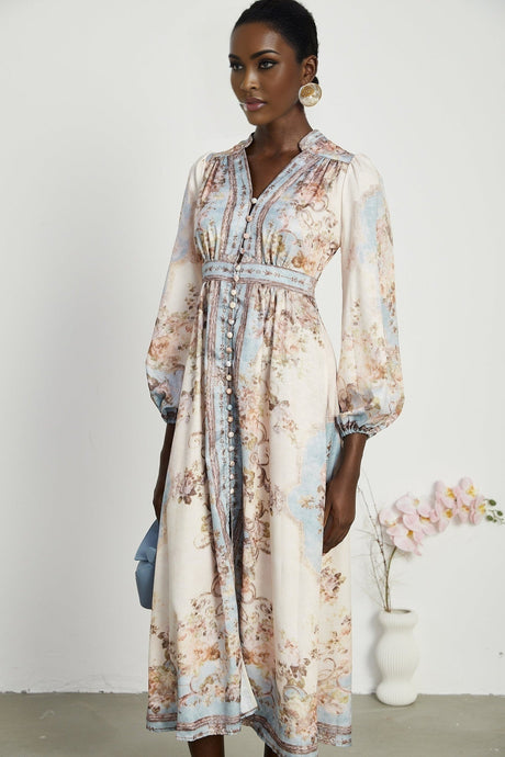 Woman wearing long sleeve floral print dress with bohemian style and flowing skirt