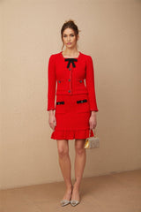 Woman wearing red braided waffle knit jacket and matching skirt set Cynthia style outfit