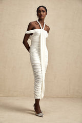 Woman wearing white midi dress with braided rope details and sleeveless design