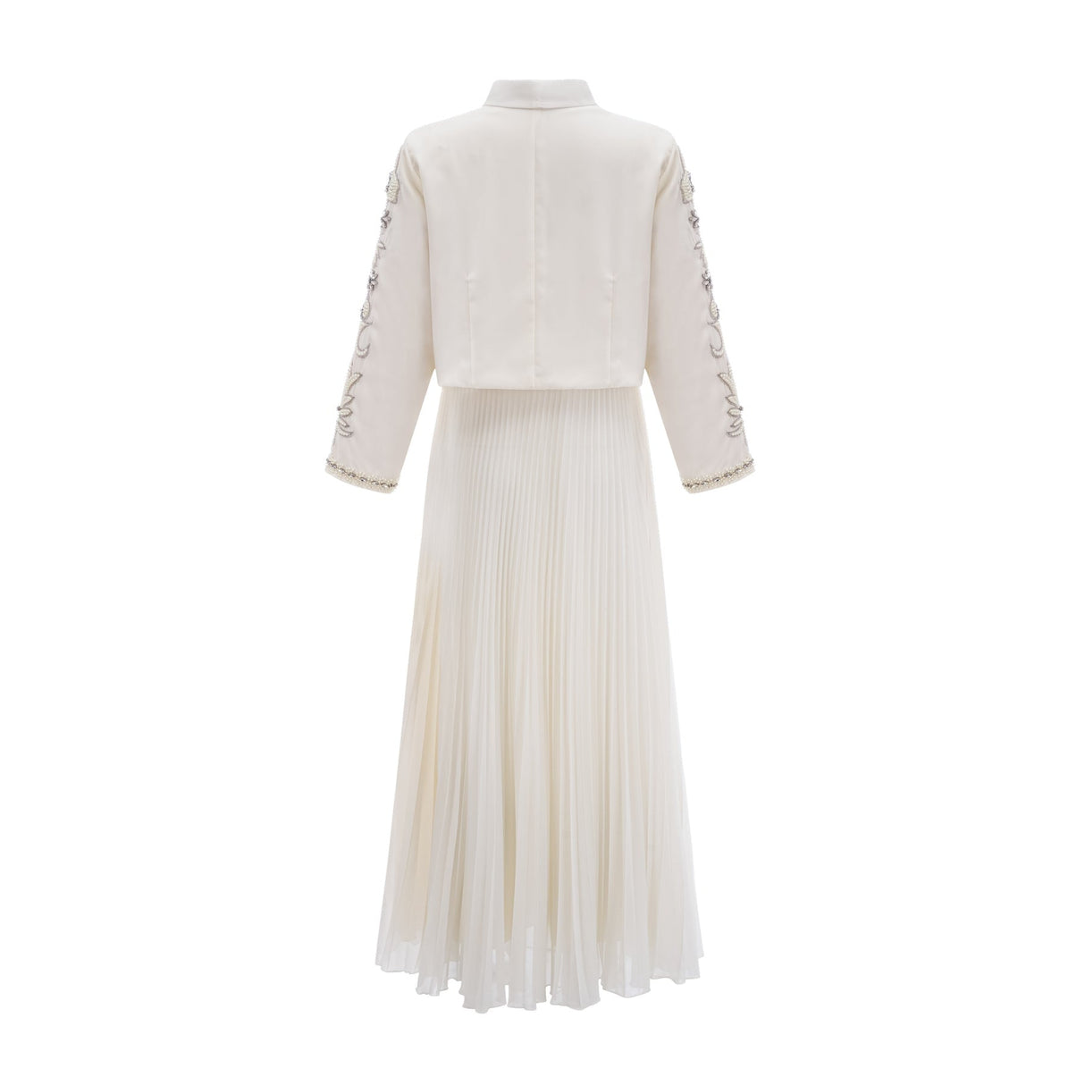 Woman wearing white pleated jacket and dress set with embellishments Blanche collection Matching outfit for formal occasions