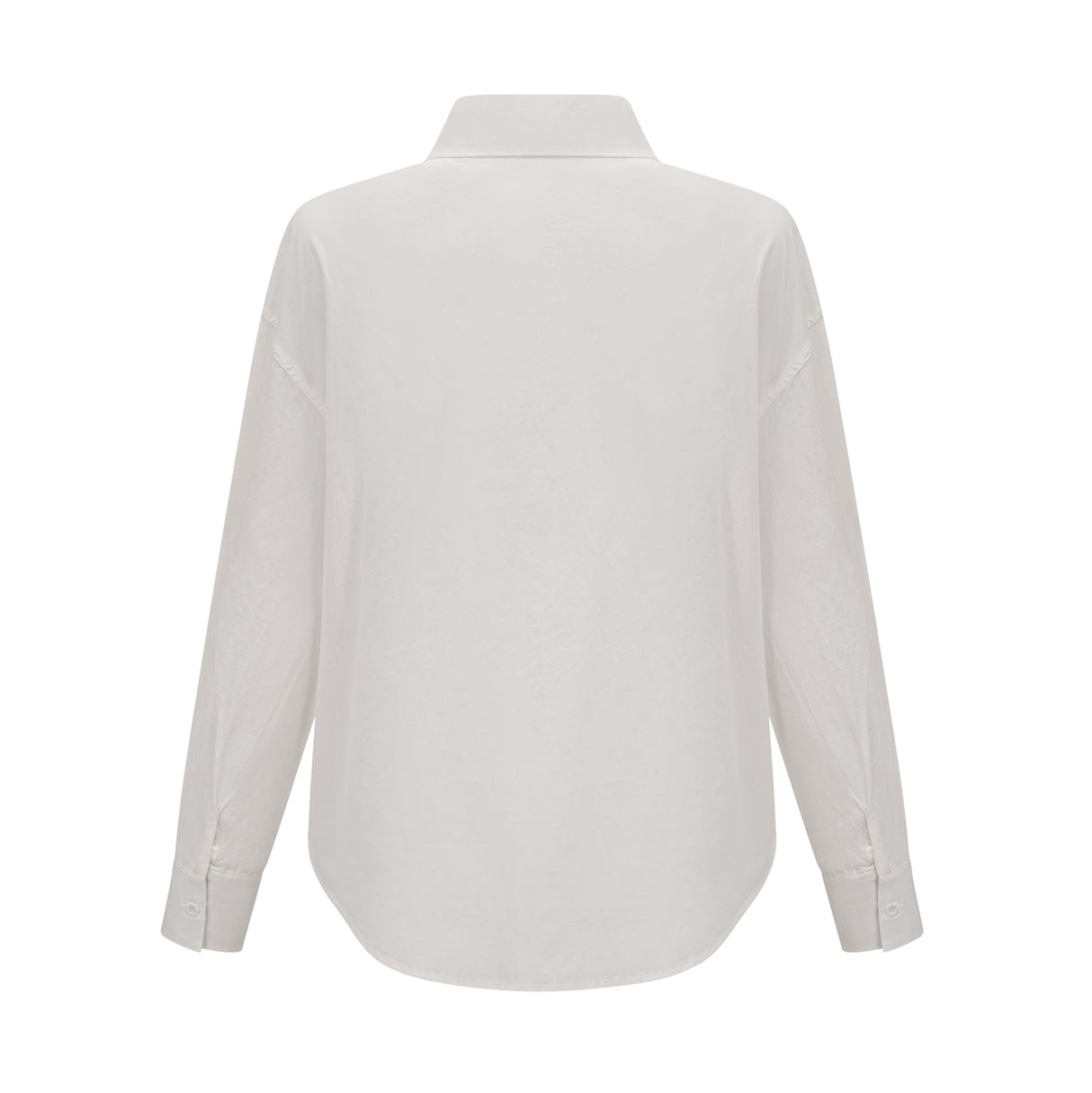Woman wearing white shirt with floral pattern and cutout details