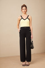 Womens three piece knitwear set including cardigan vest and trousers in contrasting colors