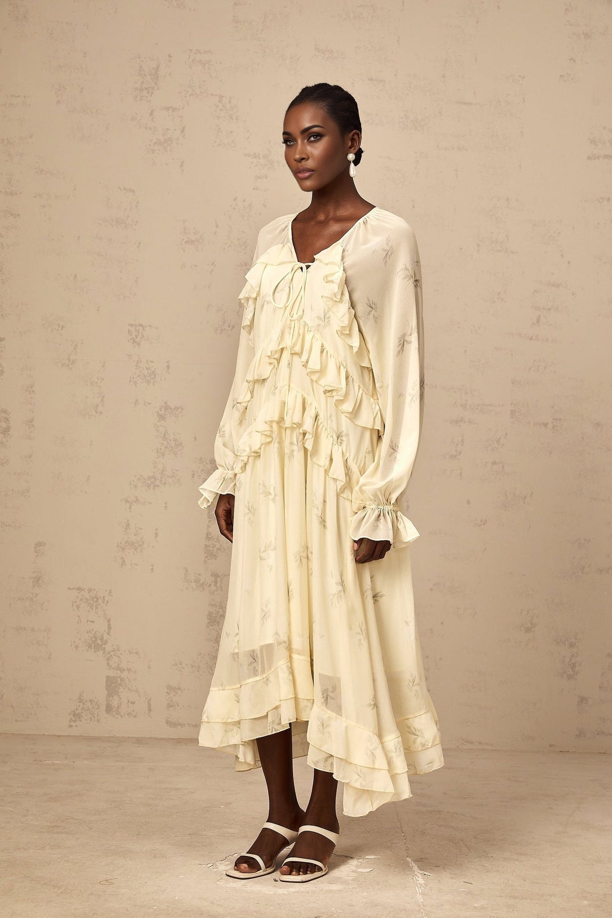 Yellow floral print midi dress with ruffles and chiffon fabric featuring a delicate pattern and feminine design
