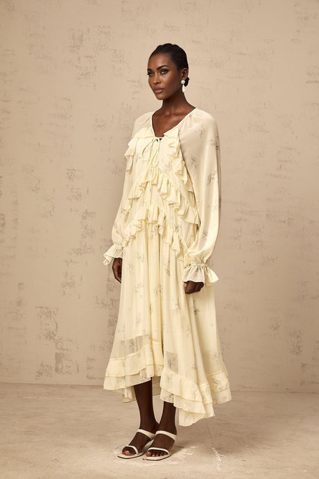 Yellow floral print midi dress with ruffles and chiffon fabric featuring a delicate pattern and feminine design