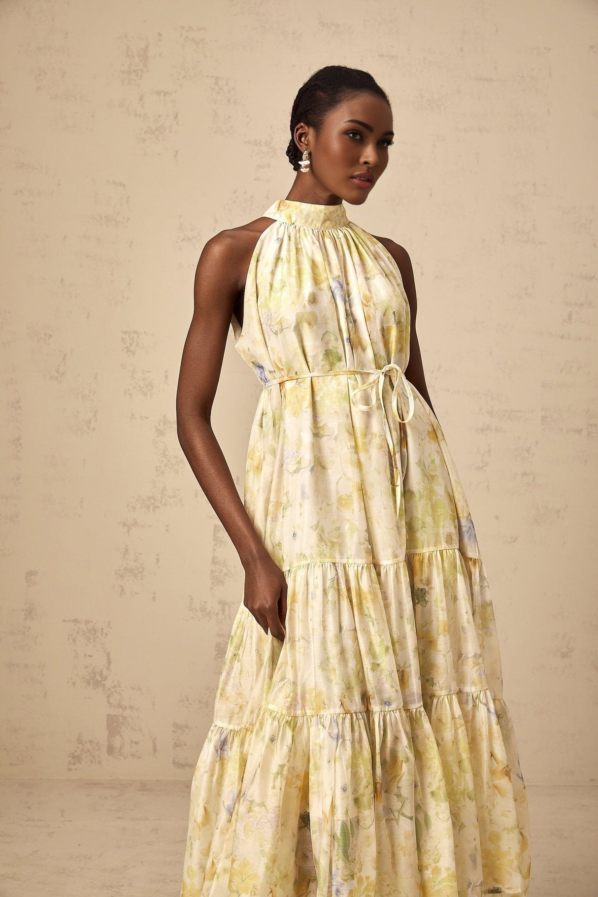 Yellow sleeveless midi dress with floral print pattern called Ulani