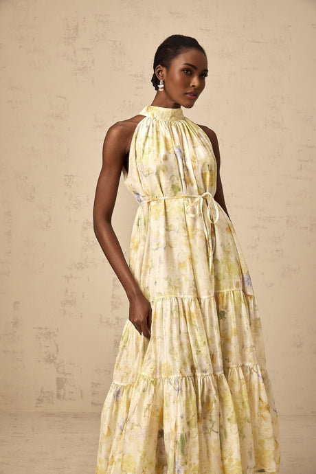 Yellow sleeveless midi dress with floral print pattern called Ulani