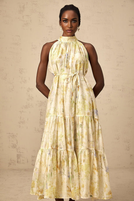 Yellow sleeveless midi dress with floral print pattern called Ulani