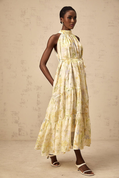 Yellow sleeveless midi dress with floral print pattern called Ulani