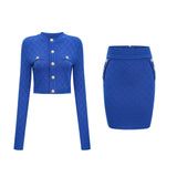 Young woman wearing a blue knitted matching set with a cropped top and mini skirt featuring decorative buttons