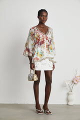 Yvonne Vneck floralprint embellished blouse