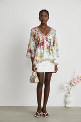 Yvonne Vneck floralprint embellished blouse
