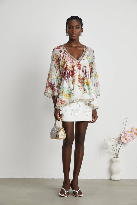 Yvonne Vneck floralprint embellished blouse