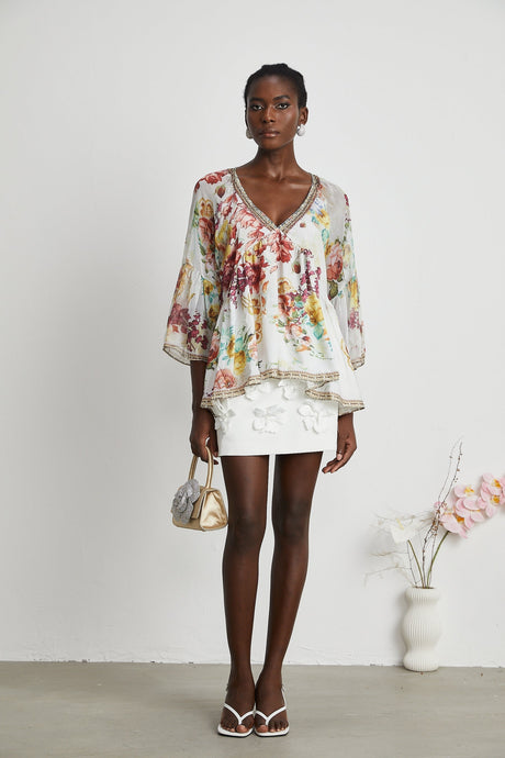 Yvonne Vneck floralprint embellished blouse