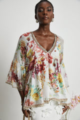 Yvonne Vneck floralprint embellished blouse