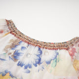 Yvonne Vneck floralprint embellished blouse