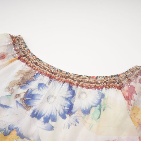 Yvonne Vneck floralprint embellished blouse