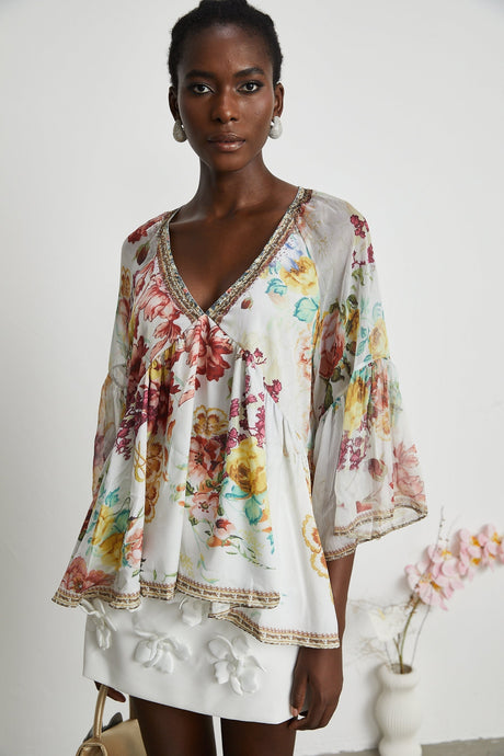 Yvonne Vneck floralprint embellished blouse
