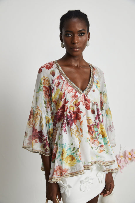 Yvonne Vneck floralprint embellished blouse